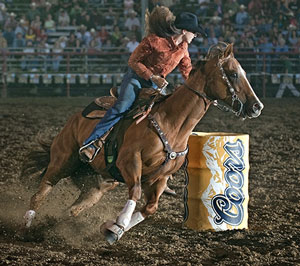 Julie Lenoir and KK Cee The Cash win the Wolf Point Stampede